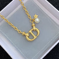DIOR CD PEDANT MOP STAR GOLD NECKLACE