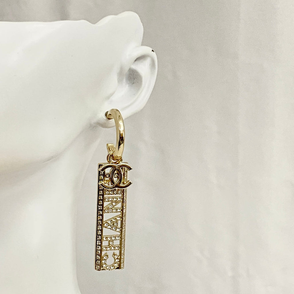 Chanel Text Diamond Paved Light Gold Drop Earrings