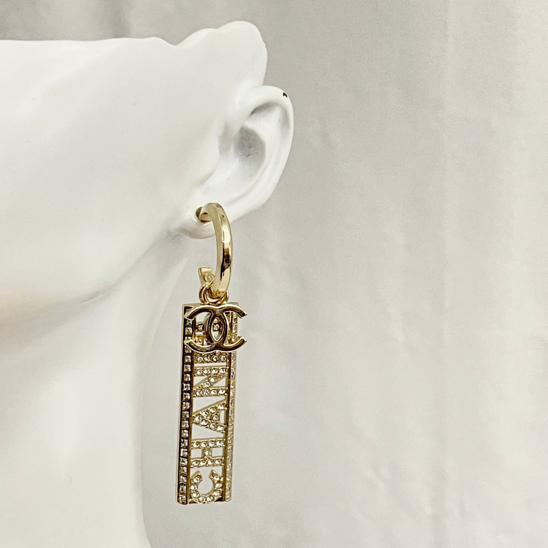 Chanel Text Diamond Paved Light Gold Drop Earrings