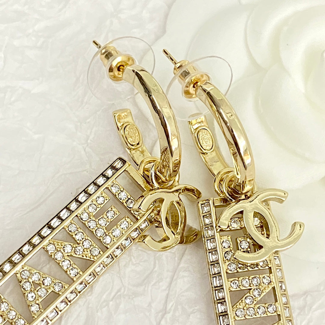 Chanel Text Diamond Paved Light Gold Drop Earrings