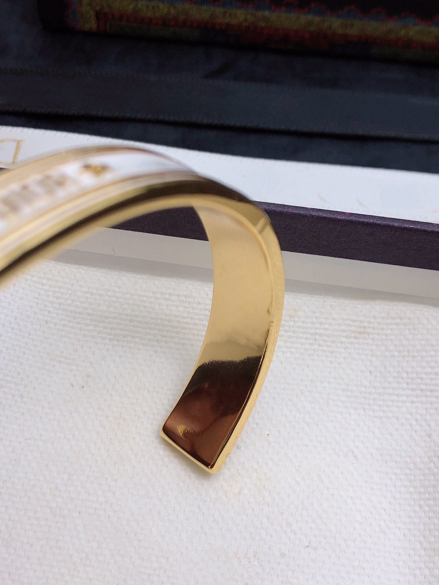 DIOR CODE BANGLE GOLD WHITE METAL AND LACQUER BRACELET