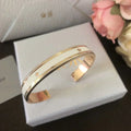 DIOR CODE BANGLE GOLD-FINISH METAL AND LACQUER WOMEN