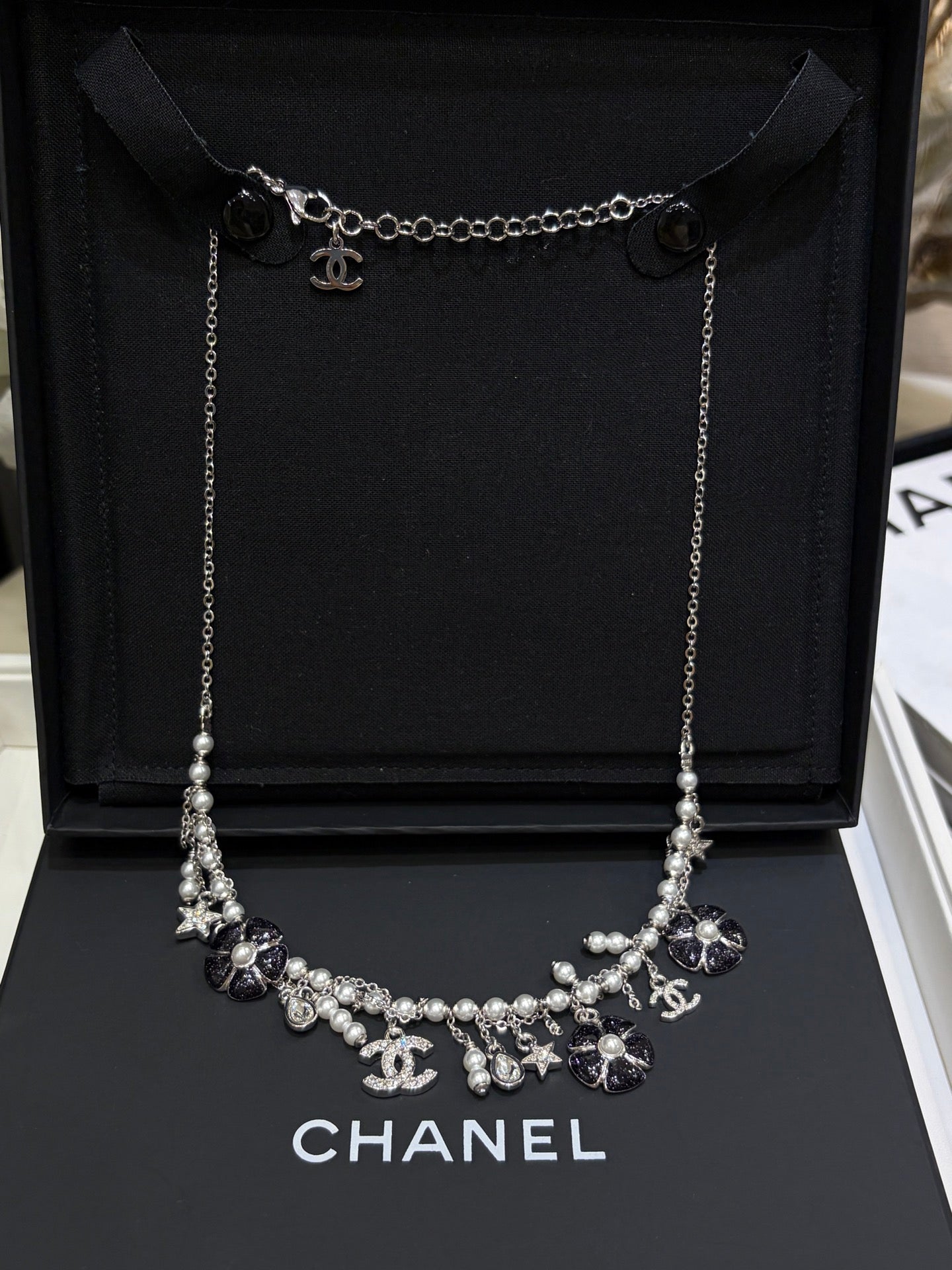 Chanel 2026 Silver Double C Black Flower Pearl Tassel Necklace