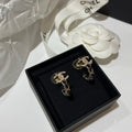 Chanel Half Circle Gold Black Leather Earrings