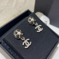 Chanel Flower Pendant Silver Black Diamond Earrings