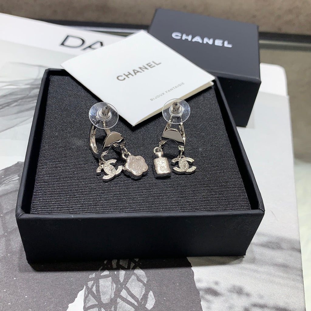 Chanel Silver Asymmetrical Earrings