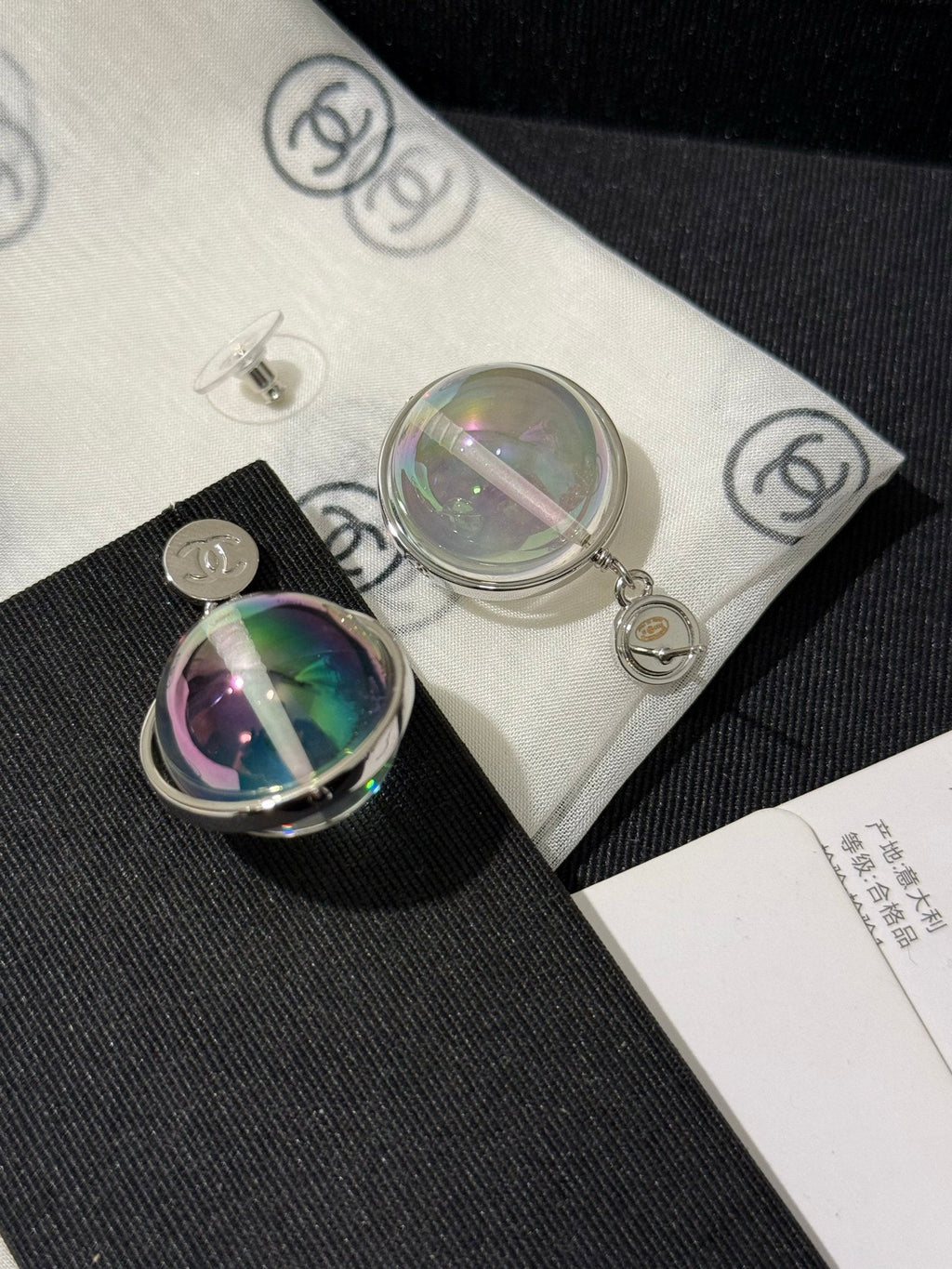 Chanel 2026 Transparent Iridescent Crystal Ball Planet Silver Button Double C Earrings