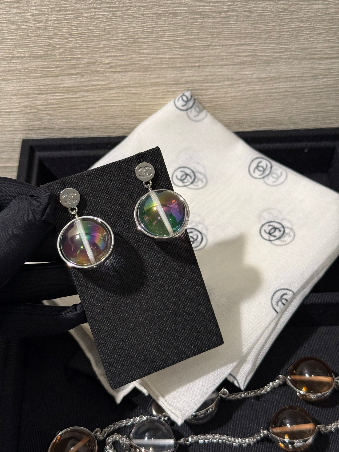 Chanel 2026 Transparent Iridescent Crystal Ball Planet Silver Button Double C Earrings