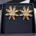 Chanel Light Gold Sunflower Earrings
